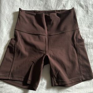 Wunder train high rise shorts with pockets 6”